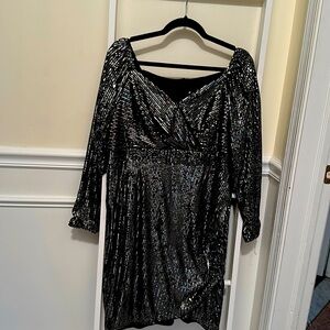 Black sequin long sleeves. Cinched on the side.